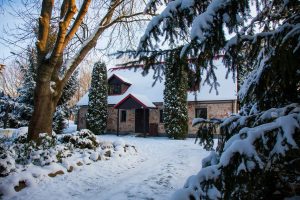 Winter home exterior with security focus, Aurora neighborhood in snow, or close-up of door lock in winter conditions