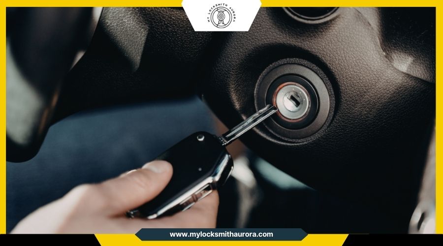 A modern car key near a vehicle ignition cylinder, highlighting fragile electronic sensors.